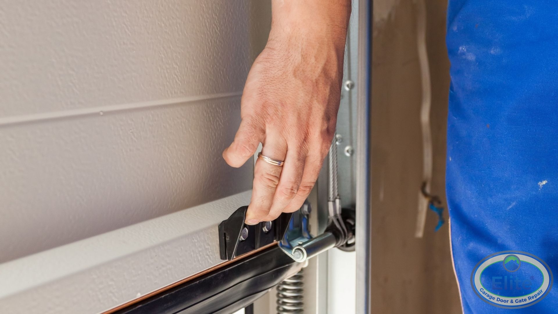 The Fast Fix: Proper Lubrication - How to Quiet a Squeaky Garage Door Fast